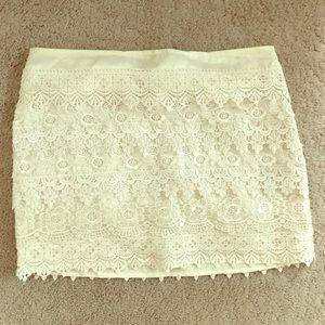 Juniors cream lace mini skirt